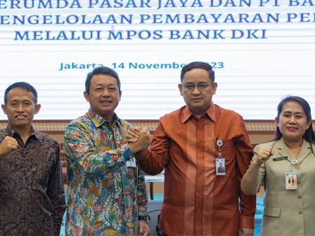  Bank DKI - Pasar Jaya Kerja Sama Pengelolaan Pembayaran Pedagang