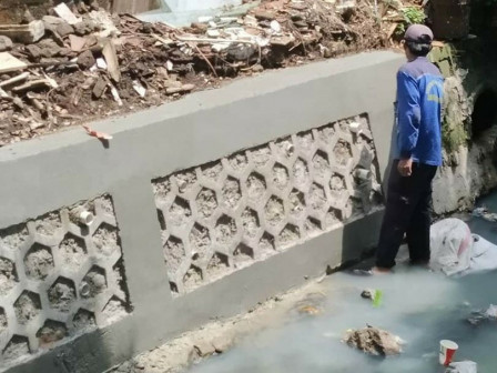 Perbaikan Turap Batu Kali PHB Jelawe Rampung