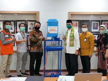 Kantor OJK Regional 1 DKI Jakarta - Banten Salurkan Bantuan Untuk UMKM