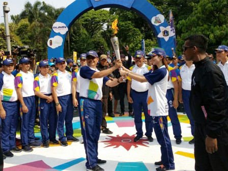 Forkopimko Jaksel Bergantian Bawa Obor Asian Games