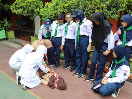  Ratusan Murid SDN 09 Kramat Pela Ikuti Aksi Mitigasi Bencana
