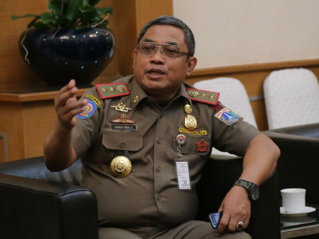 Kasatpol PP DKI Serahkan Dugaan Pemukulan Warga Kampun Pulo ke Polisi