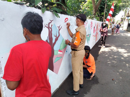 Camat Ciracas Suport Pembuatan Mural Warga Rambutan 