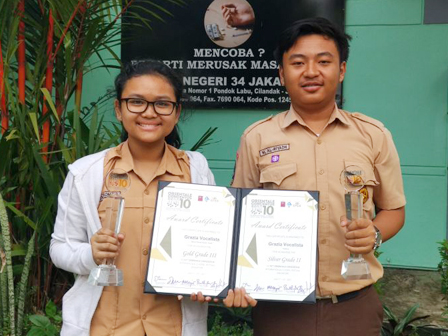        SMAN 34 Raih Dua Penghargaan Lomba Padsu di Singapura