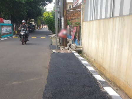 Perbaikan Jalan Taman Kembangan Abadi Rampung 