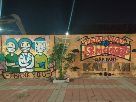Karang Taruna Sunter Jaya Bikin Grafiti Motivasi untuk Tenaga Medis