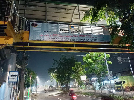 Spanduk Sosialisasi Pembangunan Saluran Phb di Jl I Gusti Ngurah Rai Dipasang