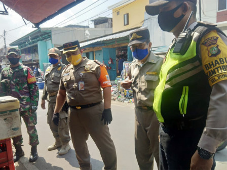  Puluhan Pelanggar PSBB Transisi di Pasar Poncol Kena Sanksi Sosial Oleh Petugas