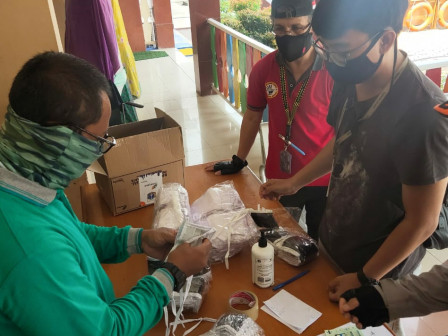 Kelurahan Pegadungan Distribusikan 181.756 Masker