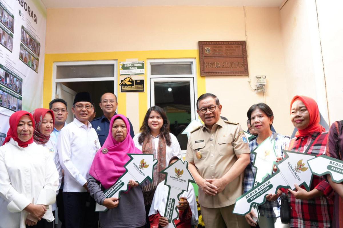 Wujudkan Hunian Layak, Dharma Jaya Berpartisipasi dalam Program Bedah Rumah